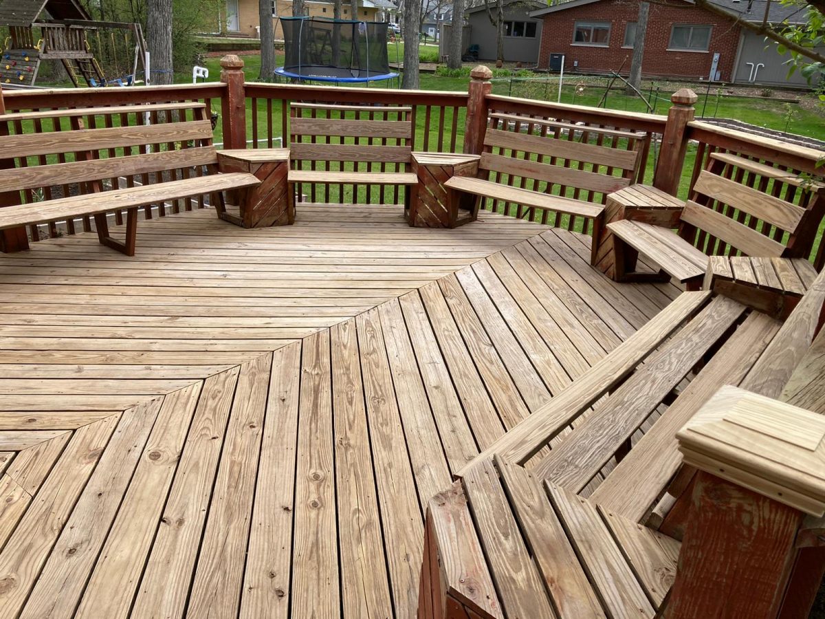 when to stain a new deck
