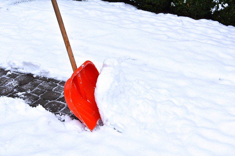 deck cleaning with plastic shovel 