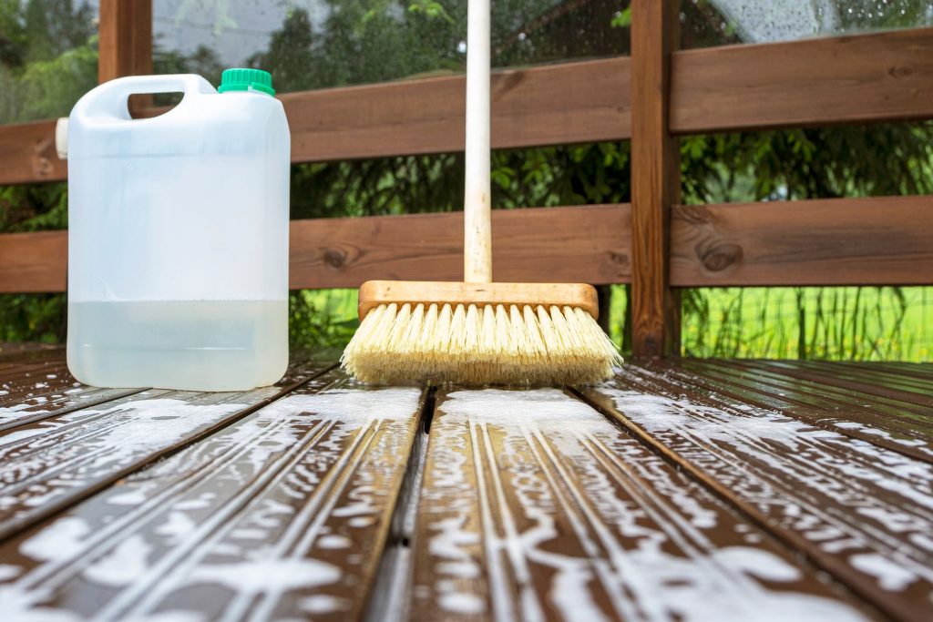 cleaning solution on the wooden deck