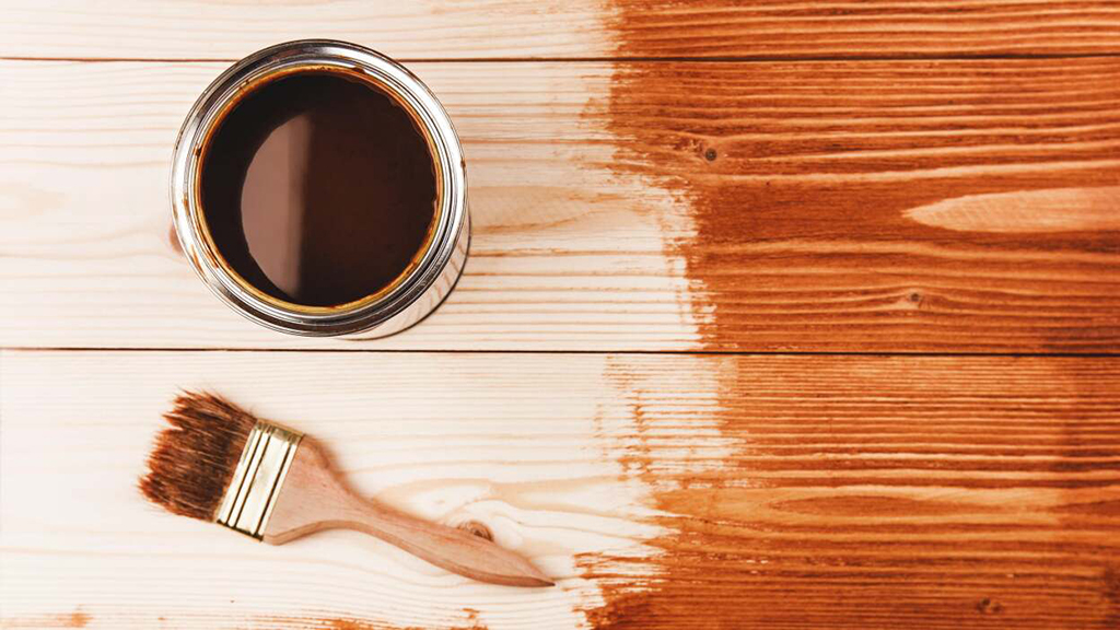 A deck being masterfully stained 