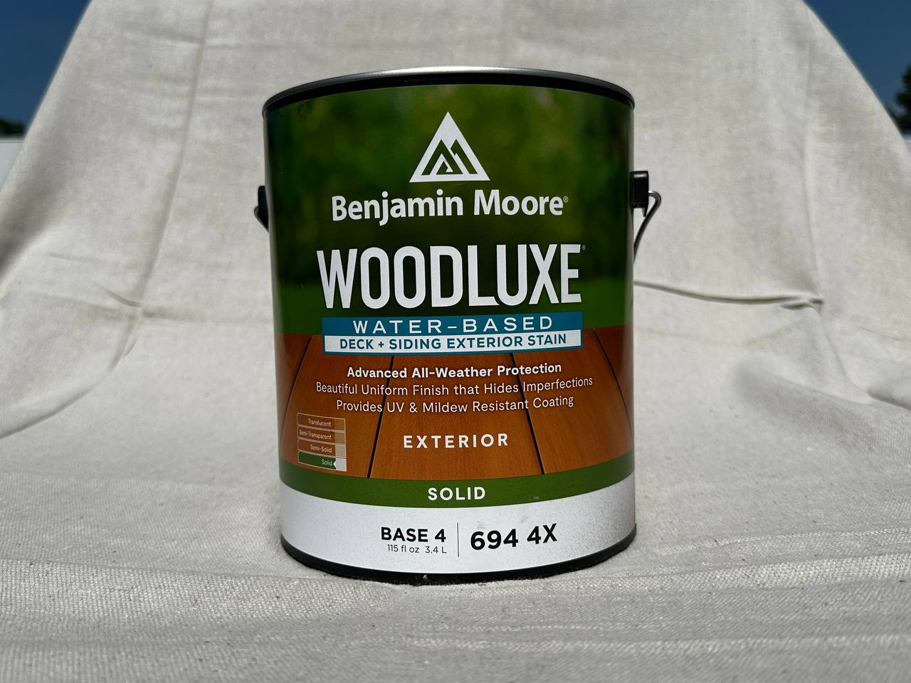Gallon can of Benjamin Moore Woodluxe water-based deck and siding exterior stain