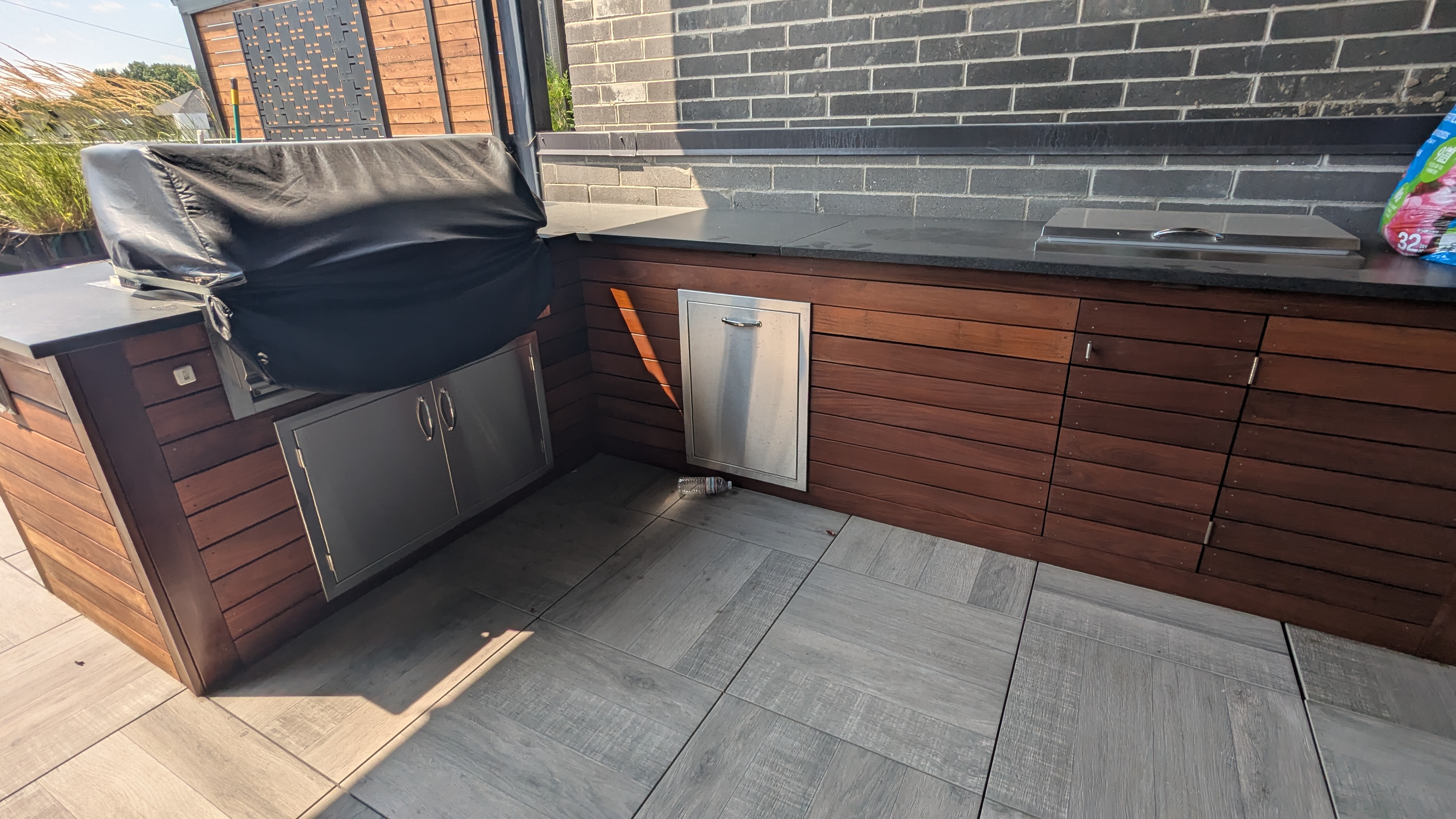 Rich Ipe hardwood outdoor kitchen finished with a natural penetrating oil